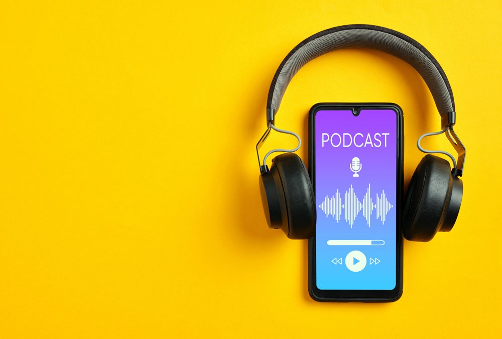 Listening,Podcast,With,Smartphone,Player,App.,Smartphone,And,Wireless,Headphone